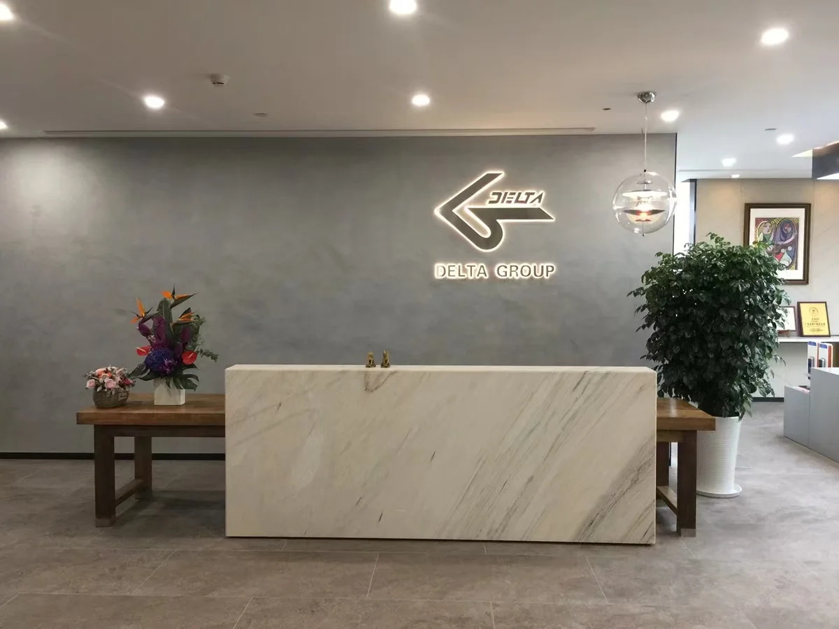 Delta company reception with DELTA GROUP signage